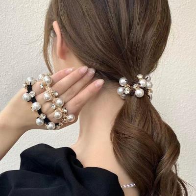 China Korean net red hair ring of a simple elegant sexy female hair rope temperament pearl head elastic band tied ponytail headdress for sale