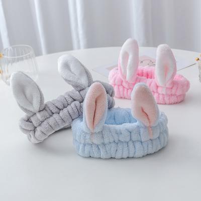 China Central Statistical Wind Makeup Hair Band South Korea Soft Face Wash Rabbit Ear Hair Band Elastic Lovely Flannel Lady Hair Band Wholesale for sale