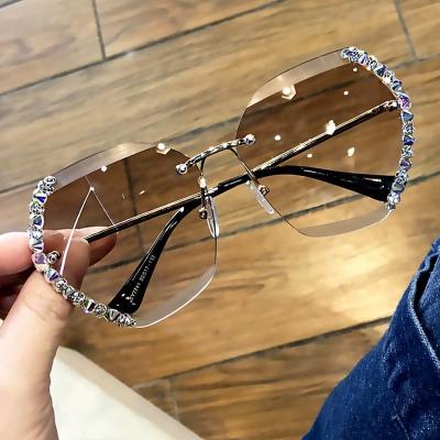 China Hot Selling Rimless Diamond Cut Lens Women Rimless Metal Bling Vintage Sunglasses Rhinestone Rhinestone Balanced Sun Glass Sunglasses for sale