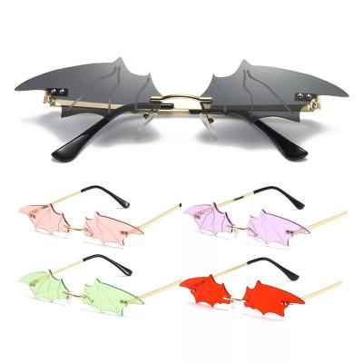 China Fashion Sunglasses Women Novelty Eye Glass Summer Fanck Rimless Thin Eyewear Bat Shaped Sunglasses For Halloween Party for sale