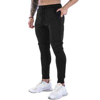 China Custom 100% Polyester Logo Men Cotton Jogger Pants Gym Clothing For Men for sale