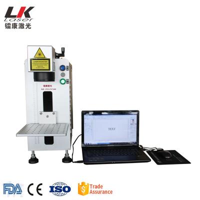 China 20W 30W Automated Charging Portable Mini Safe Closed Portable Fiber Laser Marking Machine for sale