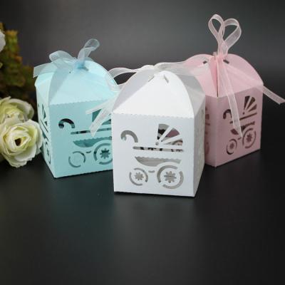 China Cute 5*5*8cm Food Baby Shower Candy Box Laser Cut Baby Carriage Model Hollow Out Gift Favors Kids Favor Box for sale