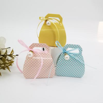 China Tiny Fashion Delicate Handbag Shaped Food Baby Shower Favors Candy Boxes Gift Packaging Paper Box for sale