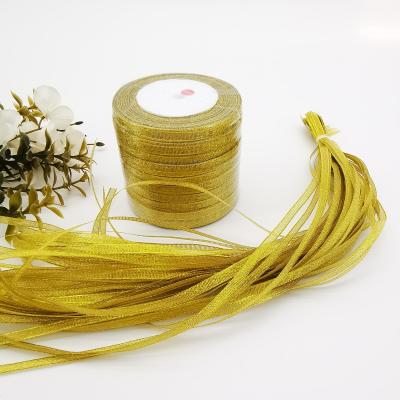 China Factory Wholesale Polyester 6mm Gift Wrapping Ribbon Polyester Gold / Silver Glittering Ribbon for sale