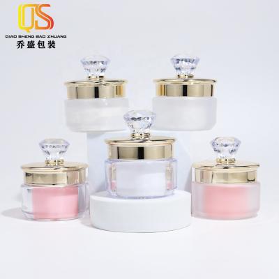 China Cosmetic diamonds cover luxury plastic jar 50g 30g cosmetic jar small cosmetic cream jar customized clear rub white and pink cream bottle for sale