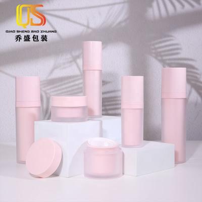 China Customized cute pink cosmetic bottle lotion cream as cosmetic plastic bottle plastic jar set package for sale