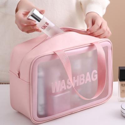 China Custom Large TPU Waterproof Logo Pink Zipper Pouch Clear Vanity Beauty Kit PVC Clear Travel Makeup Wash Bag Set Waterproof Cosmetic Bags for sale