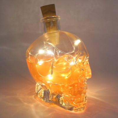 China Empty Glass Beverage 1000ml Skull Bottle For Vodka Wine Glass Bottle With Shaped Skull zu verkaufen