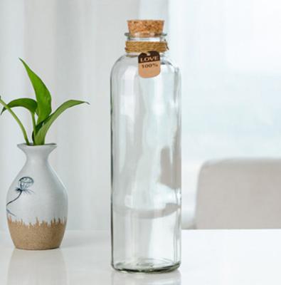 China Wholesale 350ml clear round glass beverage bottle for beverage tea milk bottle with wooden corj for sale