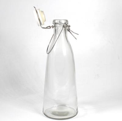 China Clear Glass Beverage Bottle Empty Glass Milk Beverage Bottle With Ceramic Top Steel Line Handle 500ml for sale