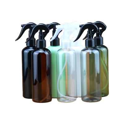 China Transparent Cylindrical BEAUTY PACKAGING Pet Plastic Spray Bottles Brown Reusable Plastic Bottles for sale