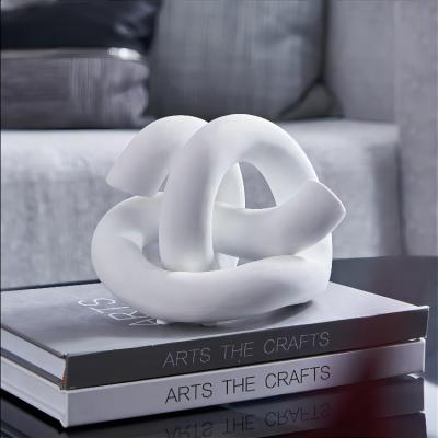 China Home Crafts Art Ornaments Ceramic Home Decorations Knotted Ceramic Twisted White Geometric Scandinavian Minimalist Decoration for sale