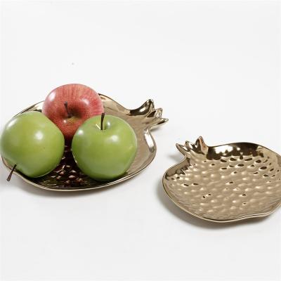 China 2021 gold decorative ceramic fruit bowl logo minimalist ceramic ceramic ornament crafts for sale