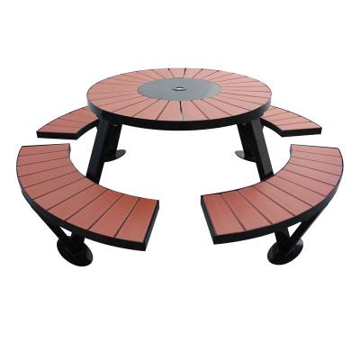 China Modern durable and rust resistant steel and wood plastic round outdoor tables with attached commercial outdoor seats picnic table for sale