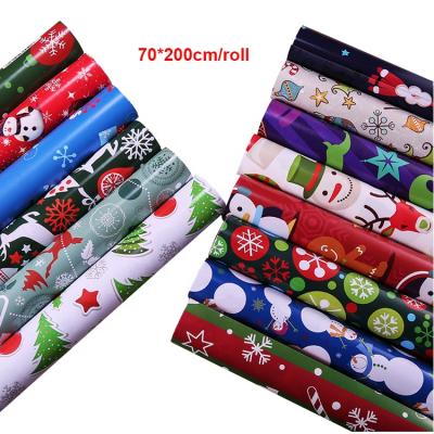 China Manufacturers Wholesale Christmas Wrapping Paper Roll 70*200cm/roll Antirust Hot Sale Gift Wrapping Paper for sale