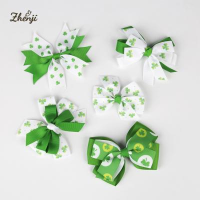 China Sweet St Patricks Day Leaf Clover Printed Hair Clips Kids Hair Bows For Decoration for sale