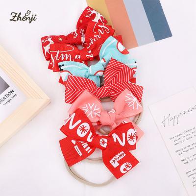 China New Sweet Bowknot Hair Accessories Christmas Printed Soft Elastic Nylon Hair Band Girls Headband 2367 for sale