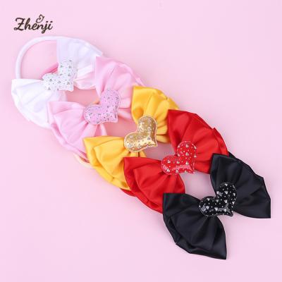 China Three-Layer Solid Color Valentine's Day Children's Bowknot Sweet Baby Headband Nylon Bowknot Love Hair Band for sale