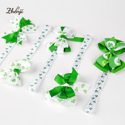 China Sweet Holiday Four Leaf Clover Bow St. Patrick's Day Children's Day Kids Elastic Hair Band for sale