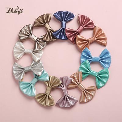 China Soft Handmade Faux PU Leather Bow Hair Clips Babies Hair Clips Newborn Kids Hair Accessories for sale