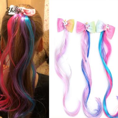 China Fashion cute kids cartoon unicorn rainbow ribbon bowknot hair bow with colorful long wig for girls hair accessories for sale