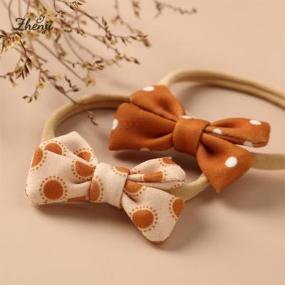 China Cute Retro Hair Bow Girls Hair Band Baby Soft Cute Headband Nylon Hair Accessories for sale