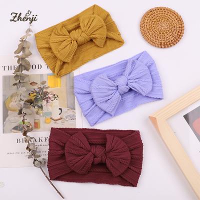 China New Children's Hair Accessories Soft Solid Color Bow Nylon Hairband 2363 Soft Elastic Baby Hair Band for sale