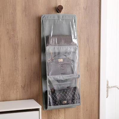 China Household Folding Storage Bag Hanging Wardrobe Hanging Leather Bag Storage Double Sided Protective Bag for sale