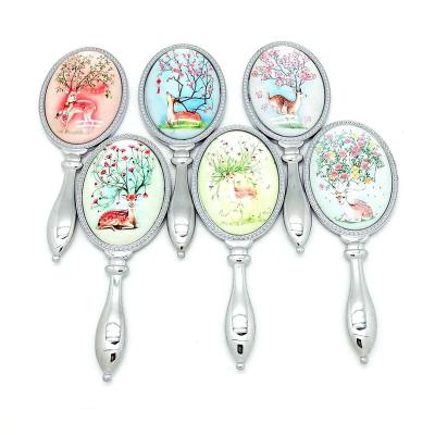 China Top-notch Oval Shape Metal Europe Quality Silver Plated Hand Mirror for sale