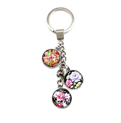 China Wholesale Promotional 3 Charms Glass Metal Keychain for sale