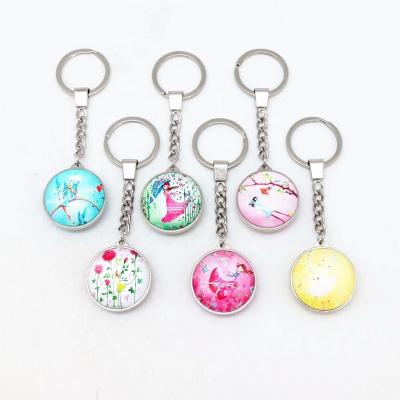 China Europe Double Sides Souvenir Round Glass Metal Key Chain Custom for sale