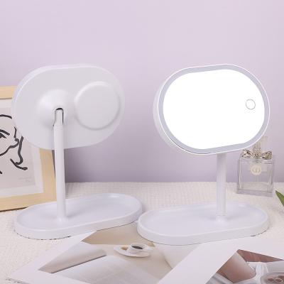 China HD Lighted Dressing Table Mirror With Touch Screen Smart Desk Makeup Mirror LED Folding Lighted Makeup Mirror for sale