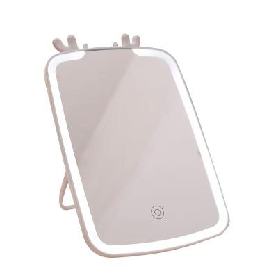 China Portable Desktop Desktop Cosmetic Smart Touch Screen Lit Deer Horn Cartoon LED Cosmetic Mirror HD Touch Screen Lighting Lamp for sale