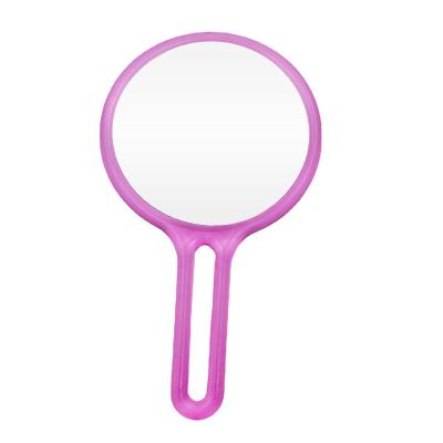 China Transparent Color Magnifying Portable Double Sided Hand Held Mirror Can Hang Bathroom Bedroom Makeup Mirror for sale