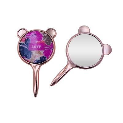 China Customized Customized Plastic Round Cute Handheld Small Makeup Mirror Portable Household Or Small Travel Mirror for sale