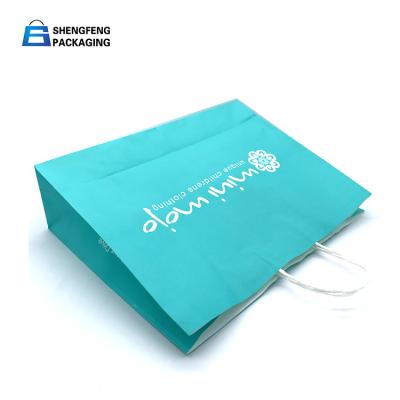 China Custom size sky blue color twisted handle luxury paper shopping bags with logo printed for sale