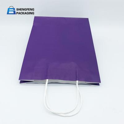 China Manufacturer Cost Price Food Grade Retail Handle Cheap Gift Shopping purple Kraft Paper Bag for sale