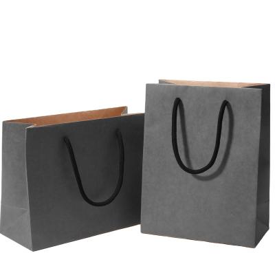 China Custom Printed Shopping Black Kraft Paper Bag Wholesale Black Craft Paper Gift Bag With PP Handle for sale