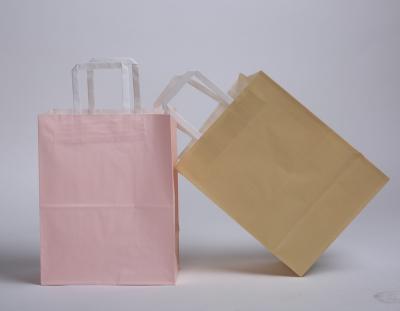 China 250 pieces kraft paper brown white paper bag for shopping red wine packaging clothing gift bag in stock for sale