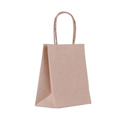 China Custom Printed Brown Kraft Shopping Paper Bag With Handles for sale