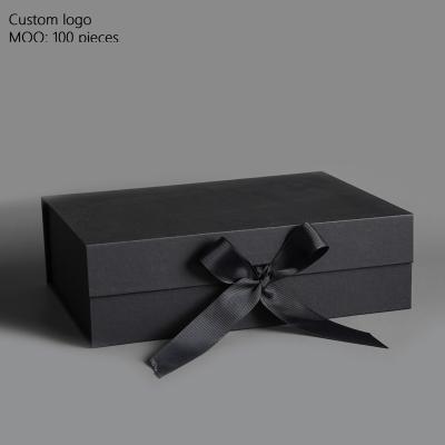 China New Hot Sale Recyclable Customized Logo Cosmetic Paper Magnetic Packaging Gift Box With Ribbon for sale