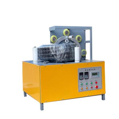 China Automatic Food Coil Wrapping Machine Tire Wrapping Machine Horizontal Steel Coil Wrapping Machine for sale