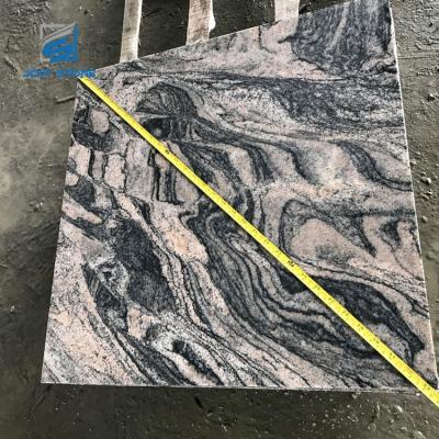 China Modern china juparana granite tile G261 granite stone with red base gray wave lines en venta