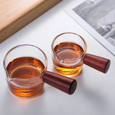 China Viable Glass Measuring Cups Milk Cup Espresso Shot Glasses For Coffee Glass Measuring Cups With Wood Handle for sale