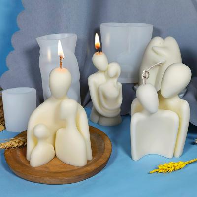 China Viable Nordic Style Silicone Resin Mold Lovers Embrace Aromatic Family Ornaments Gypsum Mold Embrace Resin Mold for sale