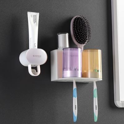 China 2022 Sustainable Popular Toothpaste Dispenser With Toothbrush Holder for sale