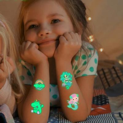 China Mermaid Temporary Luminous Forest Dinosaur Tattoo Stickers Kids Cartoon Animal Face Stickers for sale