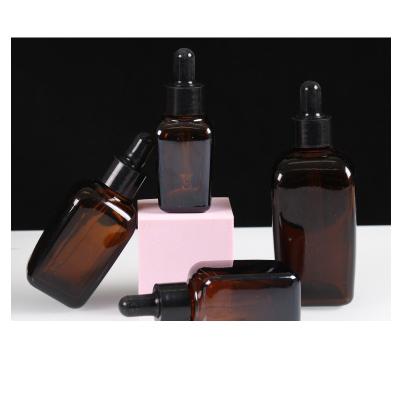 China Wholesale Recyclable Empty Glass Essence Bottle Essential Oil Square Bottle Dropper Essential Oil Cosmetic Bottle Brown for sale