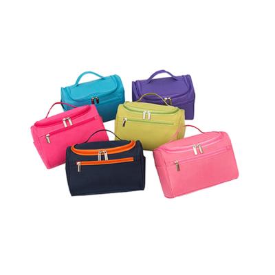 China Portable Large Capacity Casual Travel Waterproof Oxford Cloth Make Up Cosmetic Bag Wholesale for sale